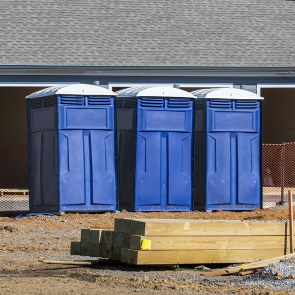 how often are the portable restrooms cleaned and serviced during a rental period in Spruce MI